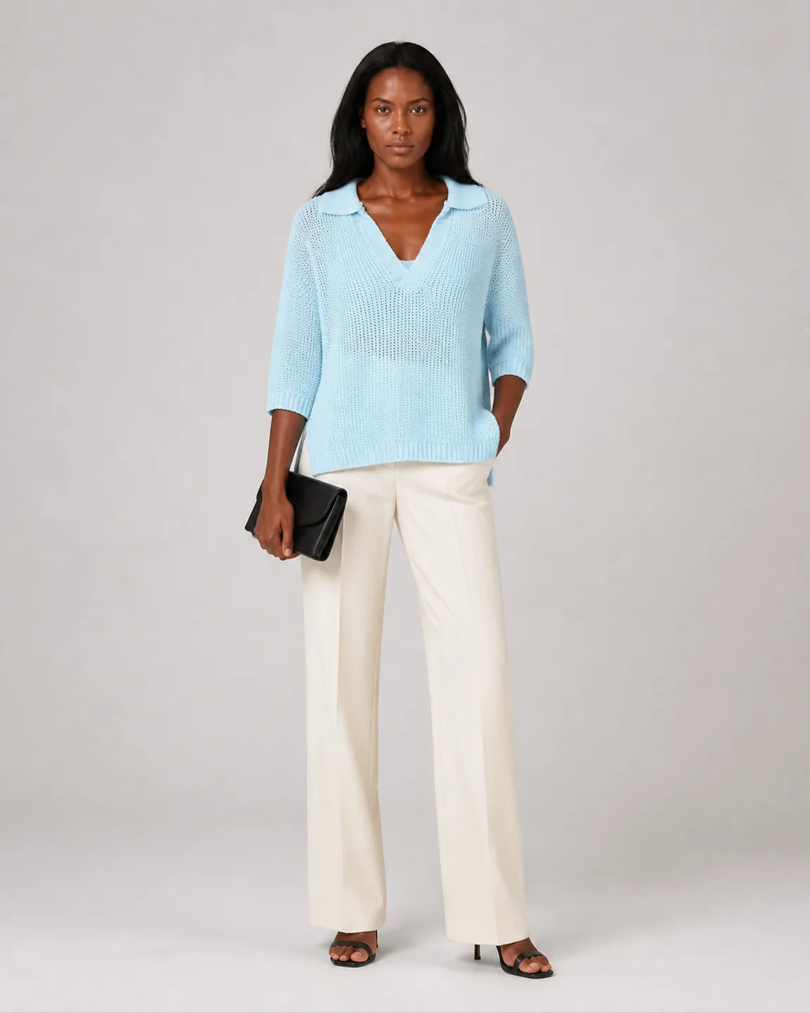 Ava-June Elegant V-neck top in Light Blue — full-body studio view
