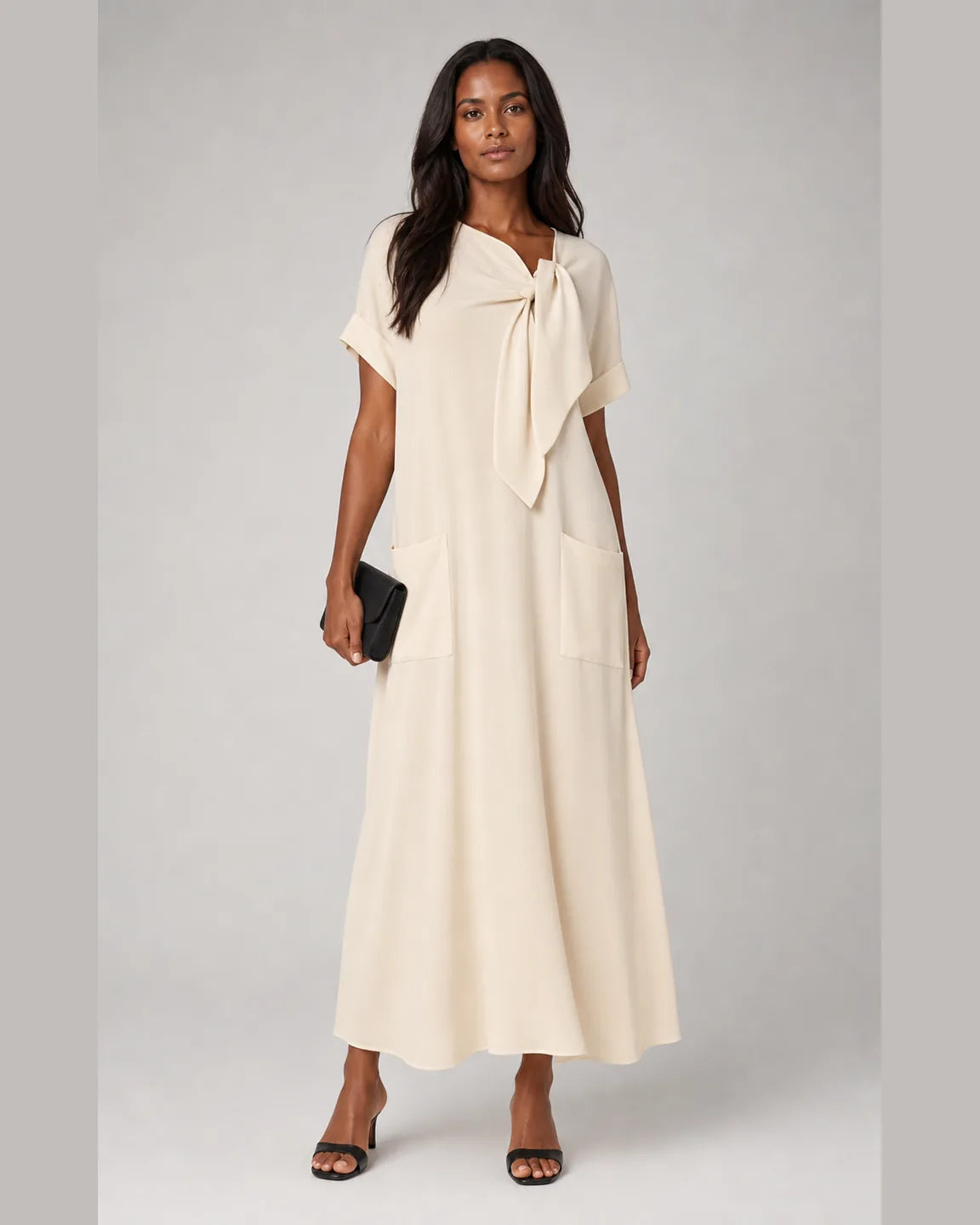 Della-Belle Elegant Dress with Pockets in Beige — full-body studio view