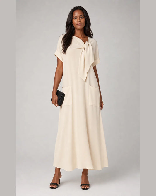 Della-Belle Elegant Dress with Pockets in Beige — full-body studio view