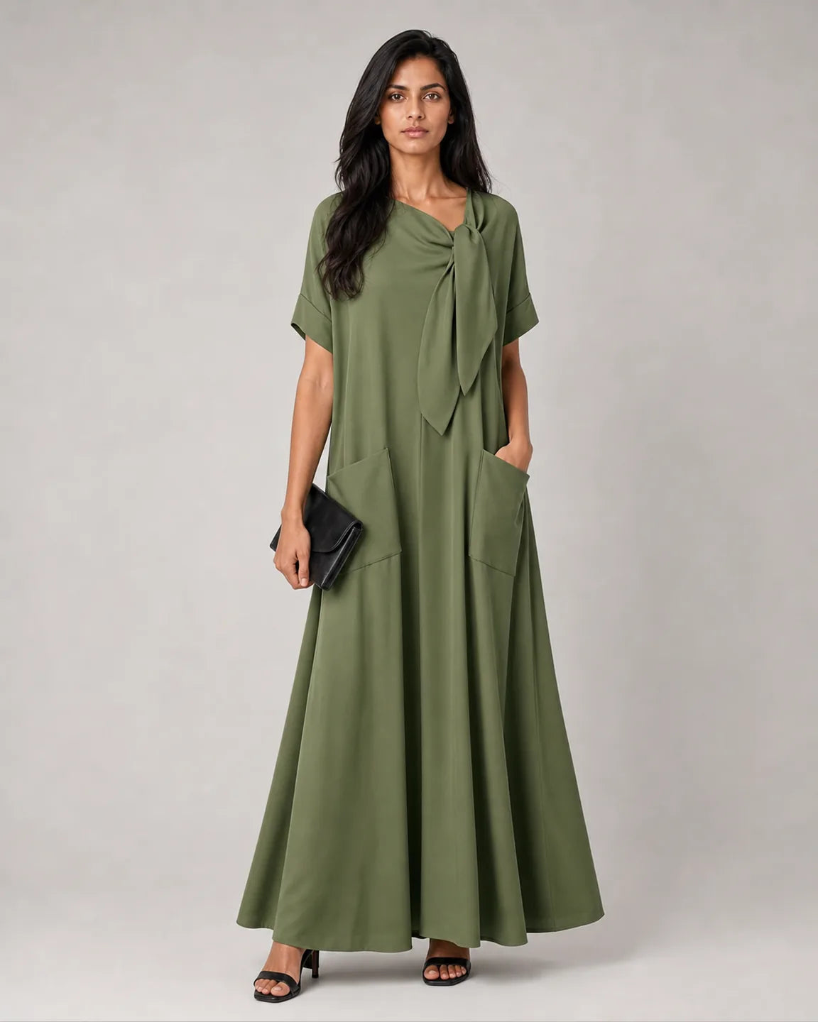 Della-Belle Elegant Dress with Pockets in Green — full-body studio view