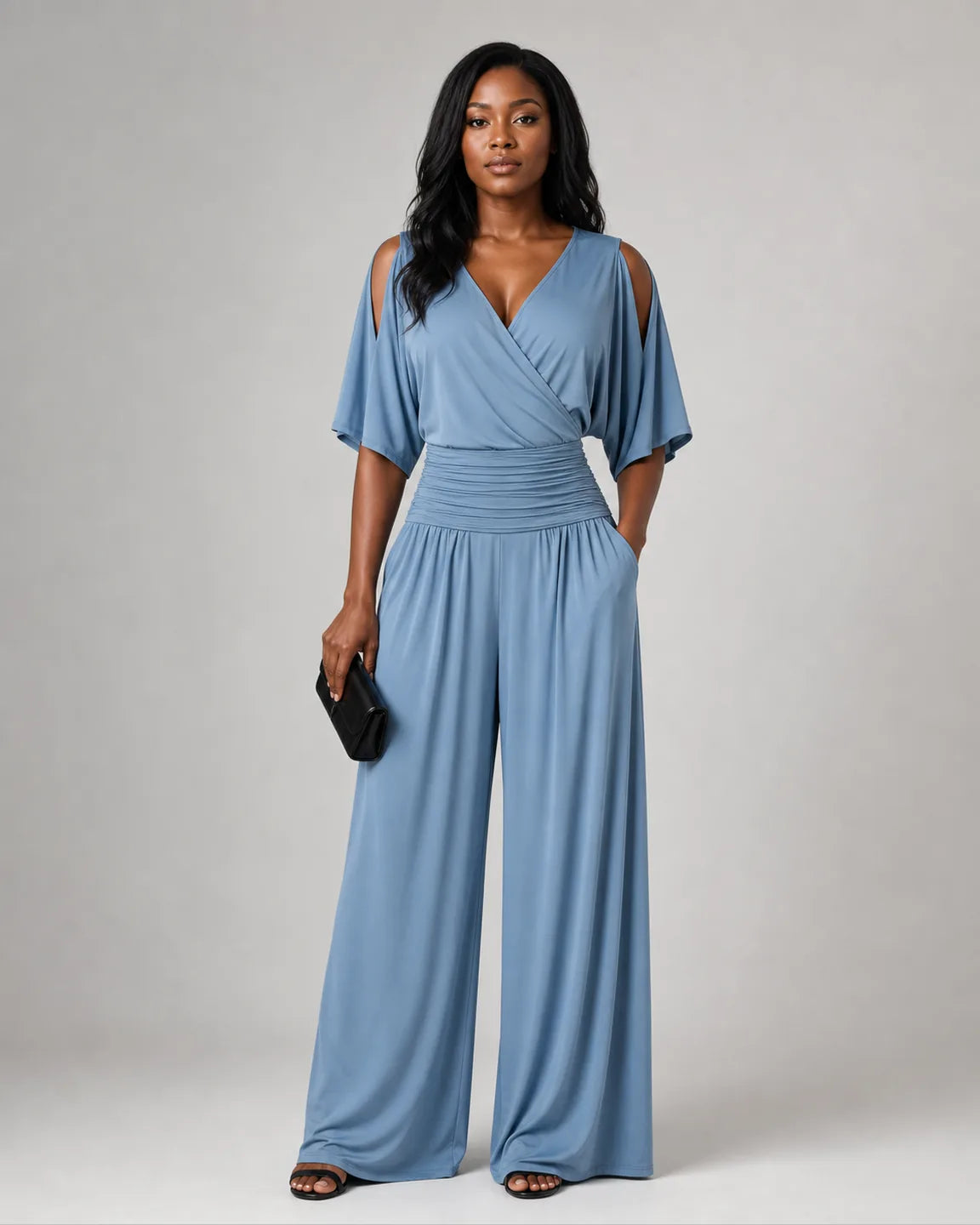 Elsa-Faye Elegant Jumpsuit in Blue — full-body studio view