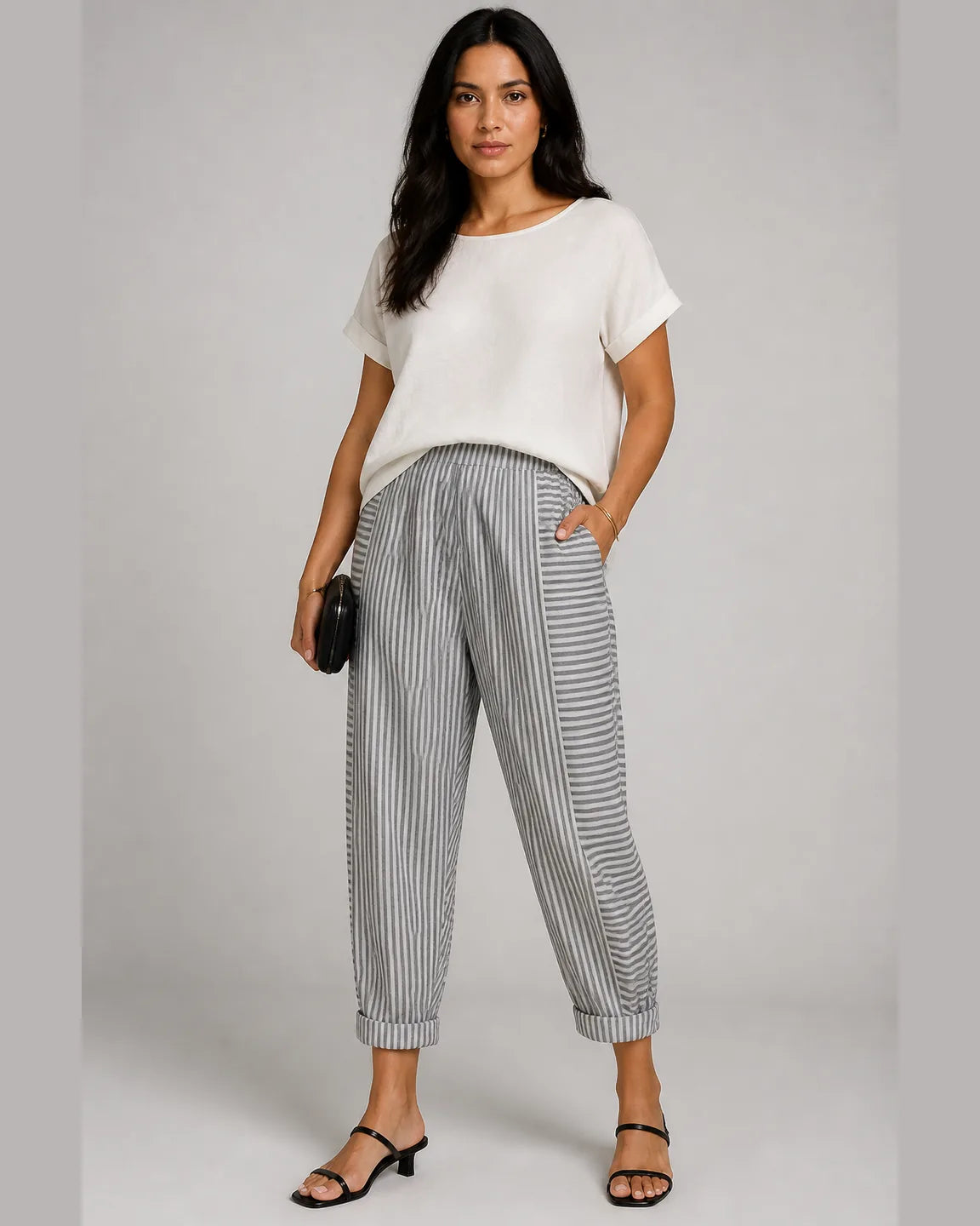 Esme-Faye Striped pants in Green — full-body studio view
