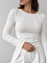 Langarmshirt mit Paspeln – Wollweiß – Seitliche Nahaufnahme